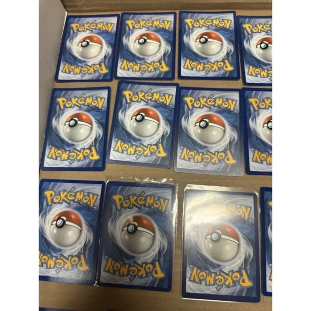 25 pokemon cards with SWIRLS 🌀 All cosmos holos Nm-dmg promos‎
